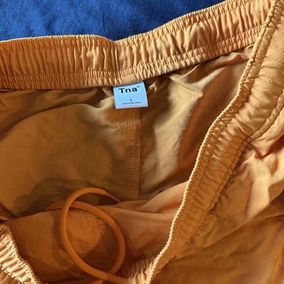TNA Women’s Small Orange Shorts Recycled Nylon Shorts EUC Sports Y3 Large - Picture 3 of 4